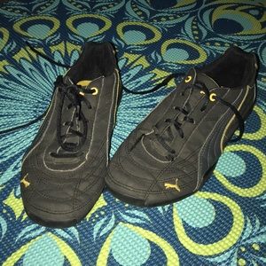 Puma black yellow and gray boys shoes